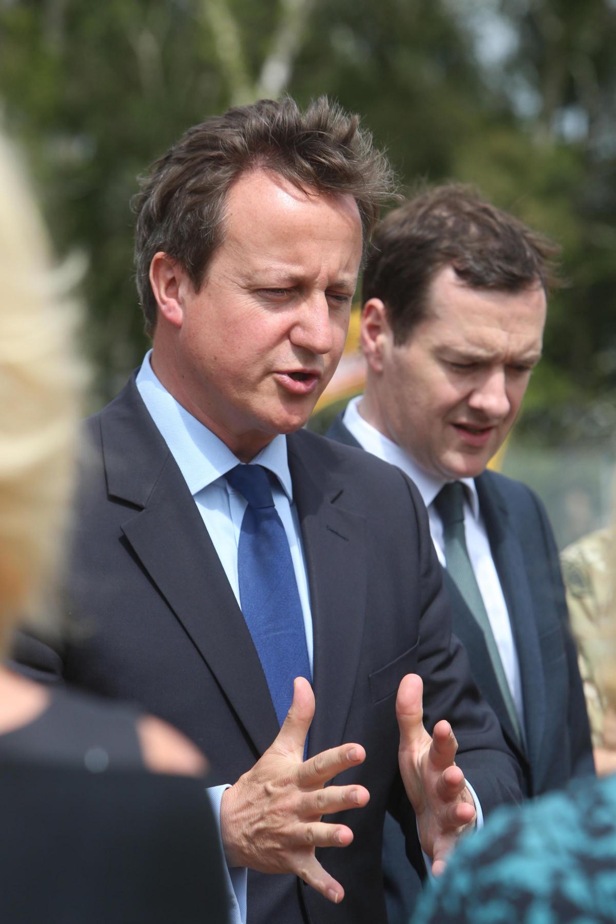 Prime Minister David Cameron and Chancellor George Osborne visit the Royal Marines base in Poole on Friday August 1, 2014