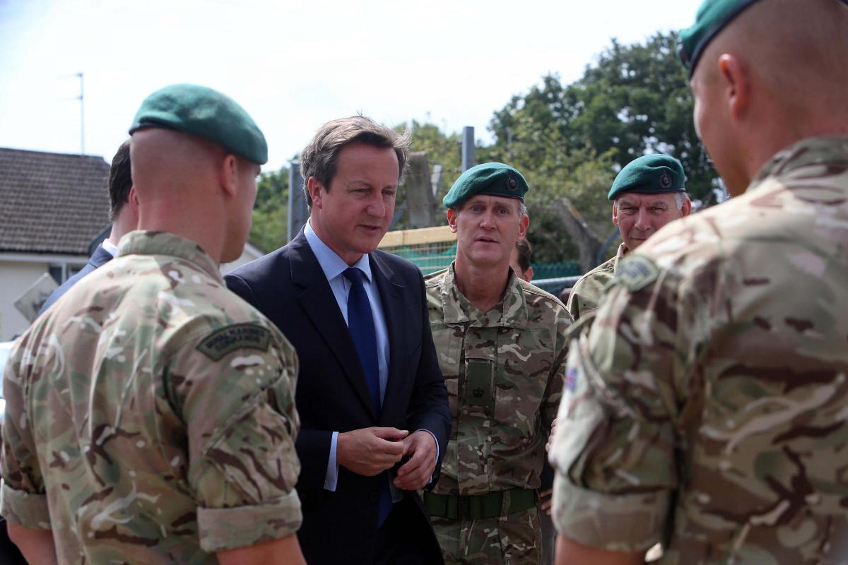 Prime Minister David Cameron and Chancellor George Osborne visit the Royal Marines base in Poole on Friday August 1, 2014