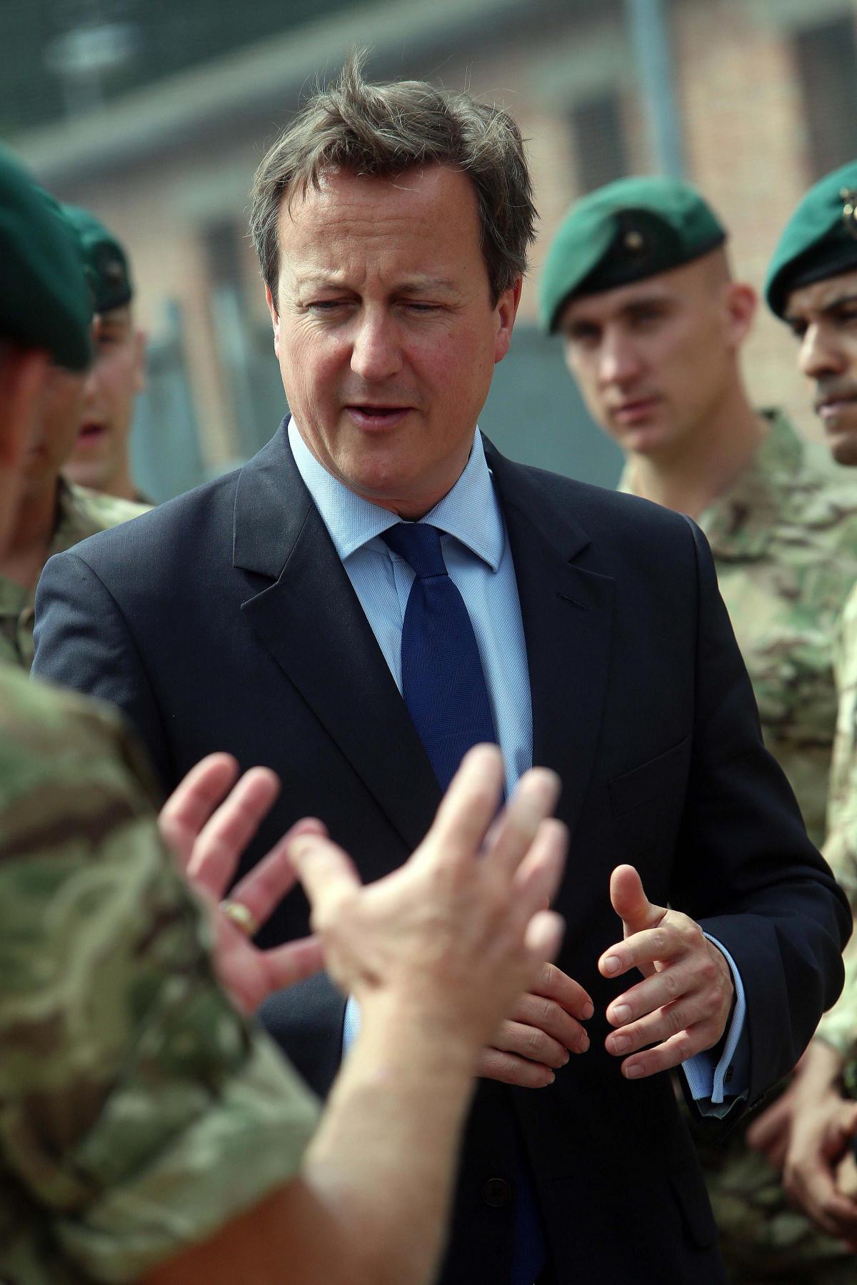 Prime Minister David Cameron and Chancellor George Osborne visit the Royal Marines base in Poole on Friday August 1, 2014