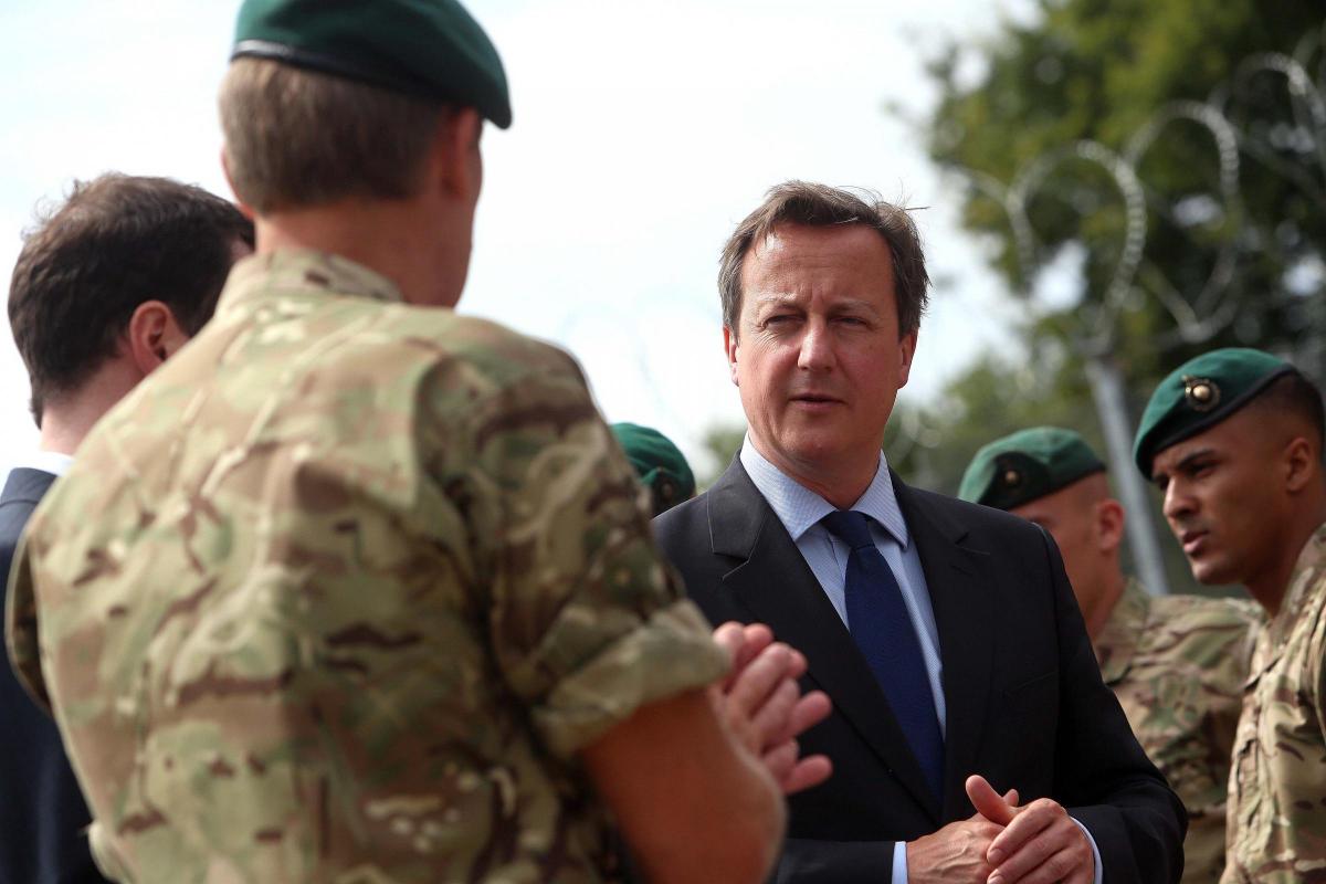 Prime Minister David Cameron and Chancellor George Osborne visit the Royal Marines base in Poole on Friday August 1, 2014