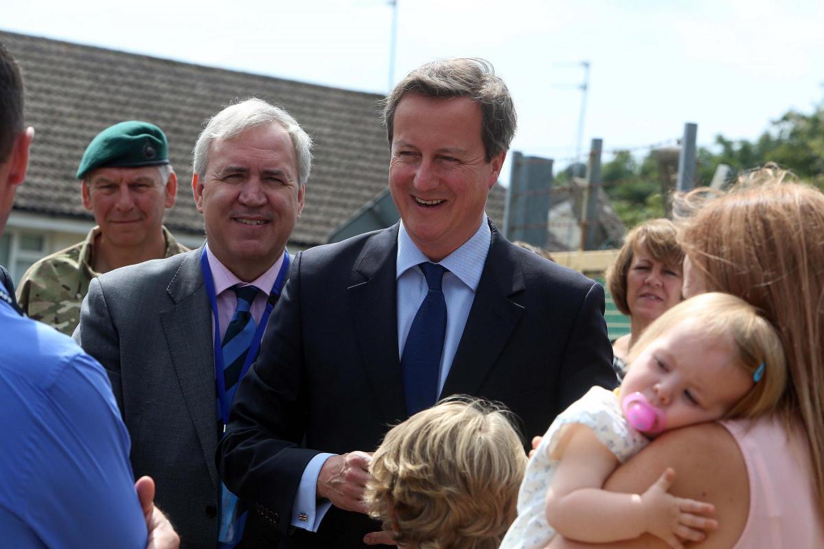 Prime Minister David Cameron and Chancellor George Osborne visit the Royal Marines base in Poole on Friday August 1, 2014