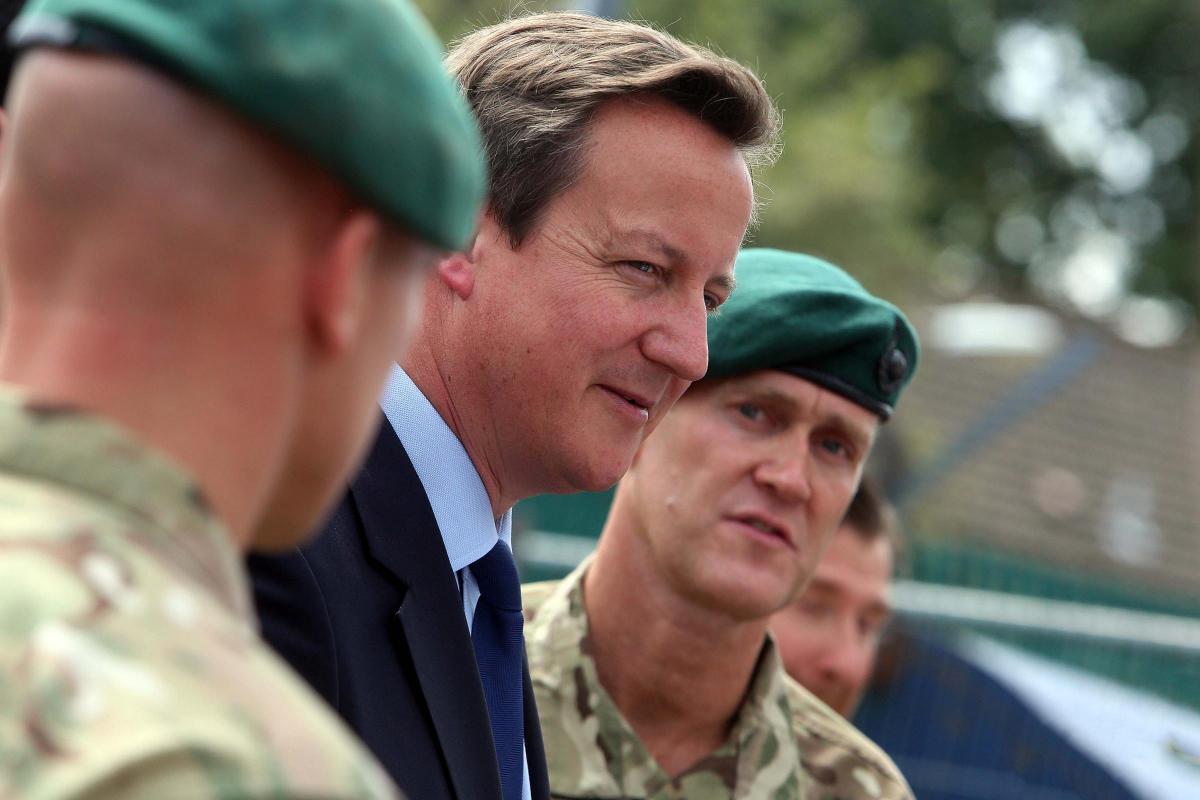 Prime Minister David Cameron and Chancellor George Osborne visit the Royal Marines base in Poole on Friday August 1, 2014