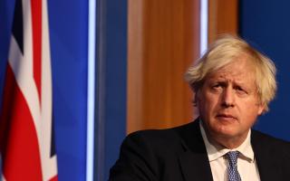 Photo shows Boris Johnson during a coronavirus press conference. Photo via PA/Adrian Dennis.