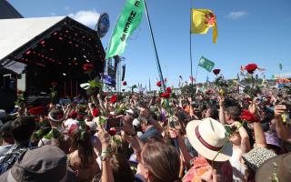 Crowds at a festival. Credit: PA