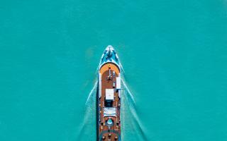 A cruise ship sailing on the ocean. Credit: Canva