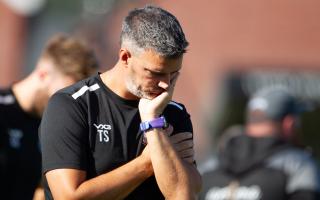 Wimborne Manager Tim Sills contemplating the score line. Wimborne Town 0-2 Weston Super Mare Played at Wyatt Home Stadium, Wimborne Saturday 14September 2024.  Photo by Steve Harris