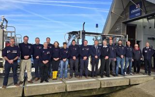 Members of the Mudeford RNLI crew awarded the King's Coronation Medal and 10 year's service badge