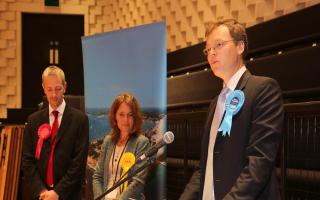 SUPPORT: Michael Tomlinson, seen at last week’s general election count, is backing Theresa May. Inset, the prime minister yesterday