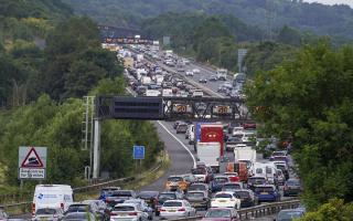 Find out when traffic will peak over August Bank Holiday as AA issues an amber traffic warning. Picture: PA