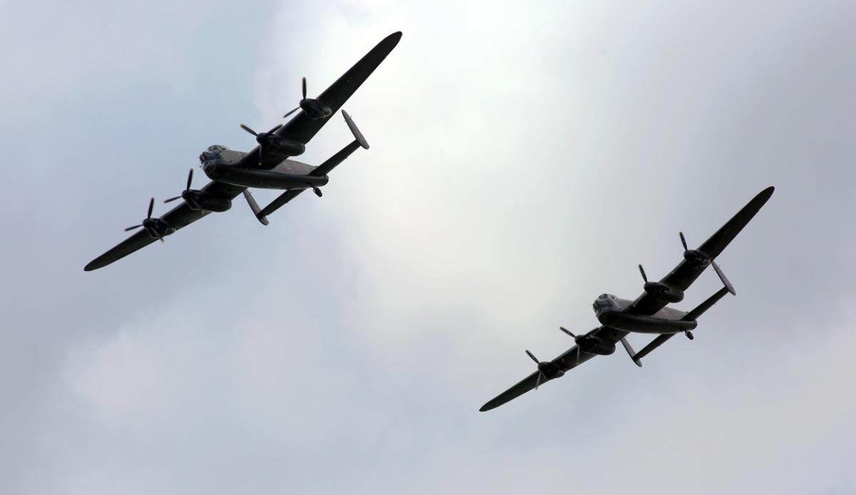 The world's two airworthy Lancasters fly in to Bournemouth Airport. Photos by Richard Crease. 