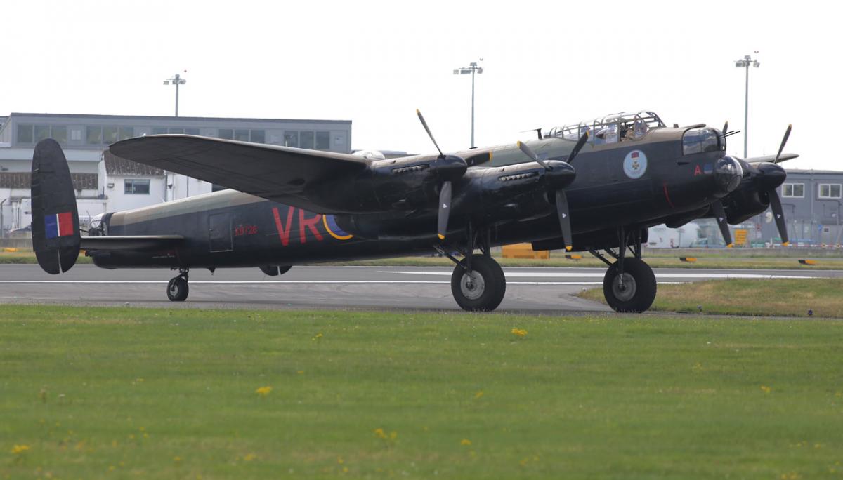 The world's two airworthy Lancasters fly in to Bournemouth Airport. Photos by Richard Crease. 