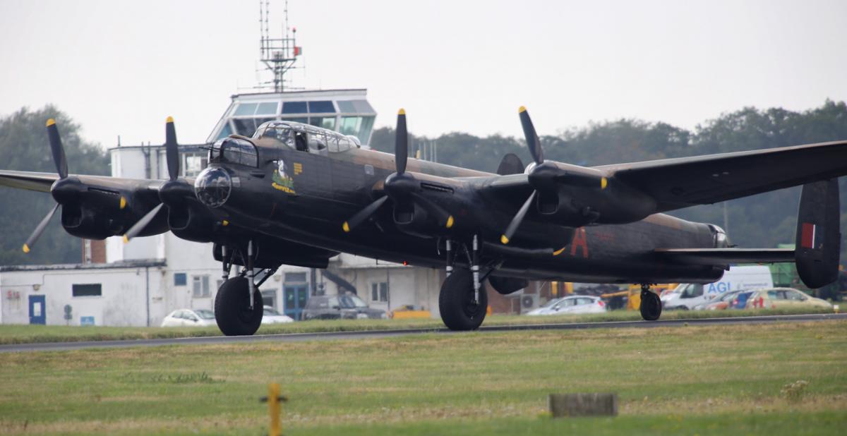 The world's two airworthy Lancasters fly in to Bournemouth Airport. Photos by Richard Crease. 