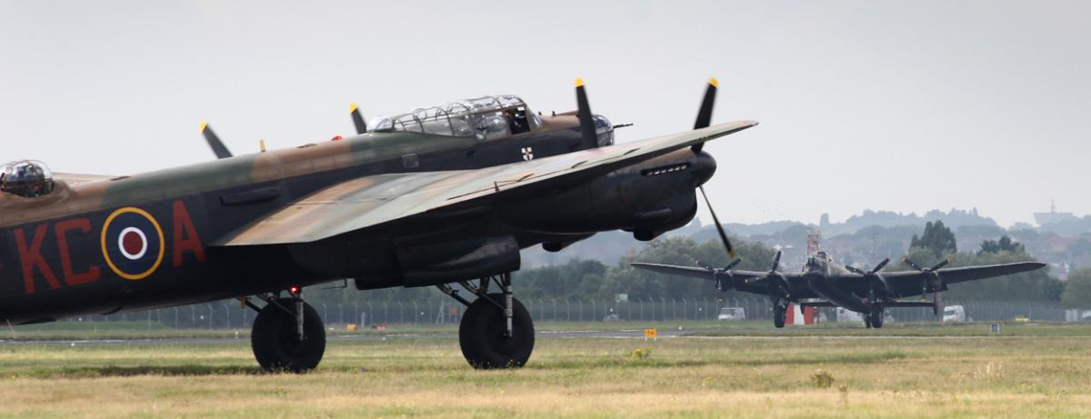 The world's two airworthy Lancasters fly in to Bournemouth Airport. Photos by Richard Crease. 