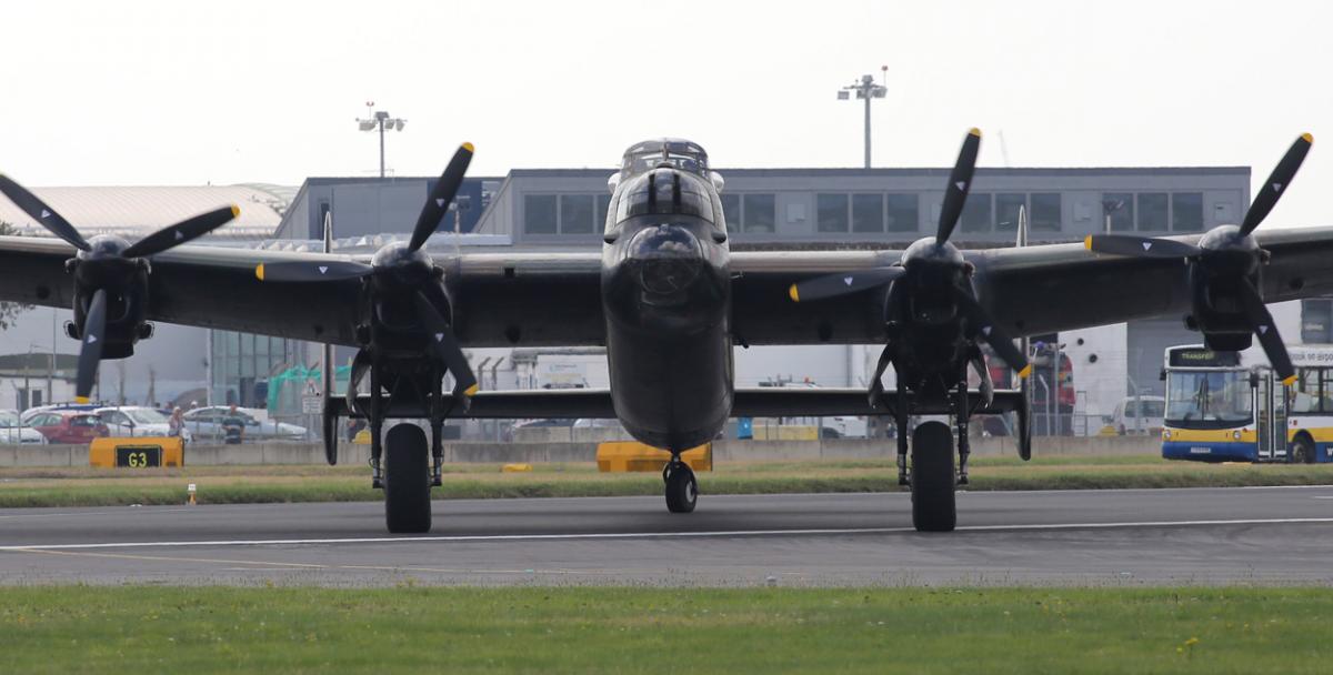 The world's two airworthy Lancasters fly in to Bournemouth Airport. Photos by Richard Crease. 