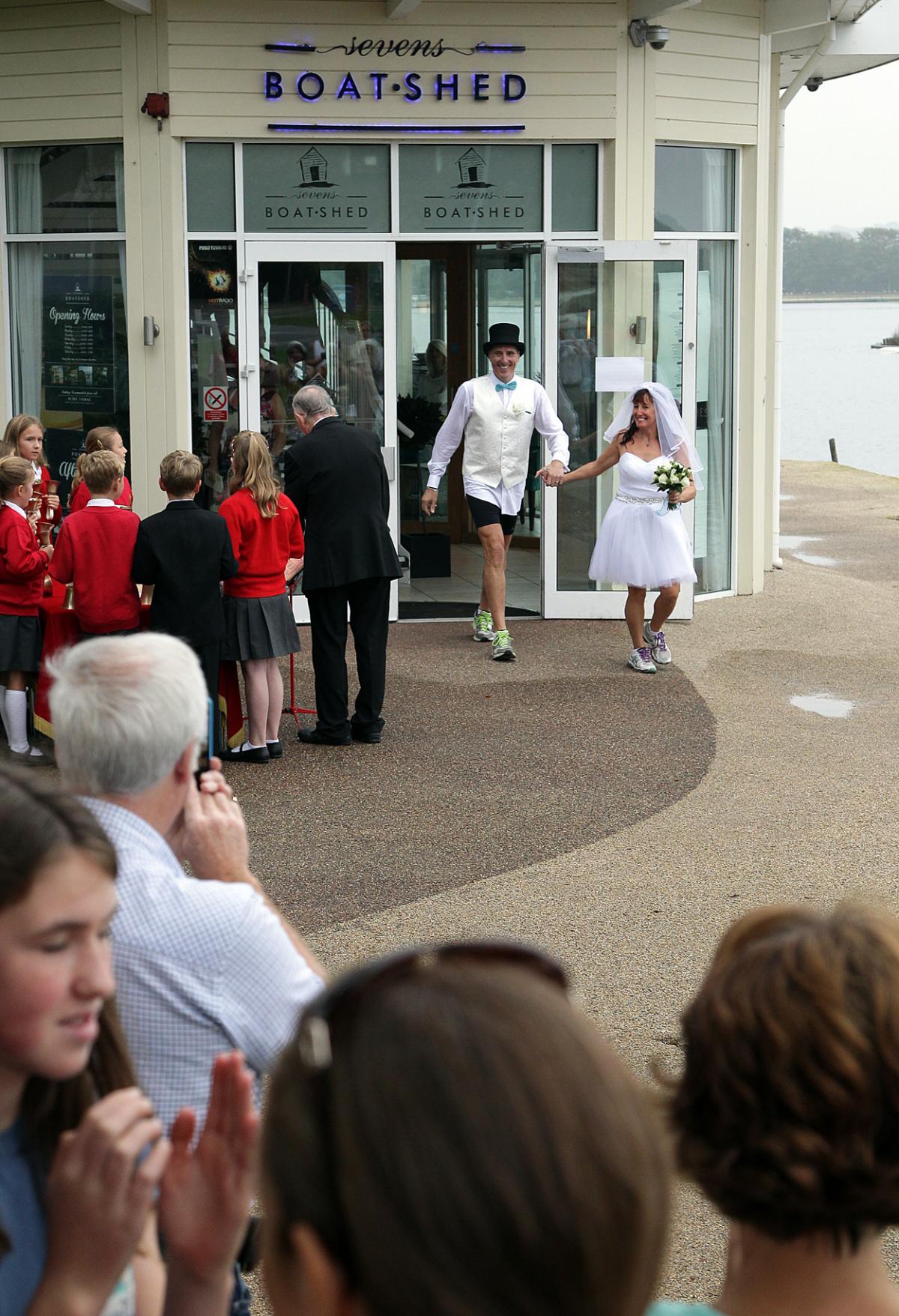 Keen runners Eve Carter and Graham Filmer tie the knot during the Poole parkrun. Photos by Sally Adams. 