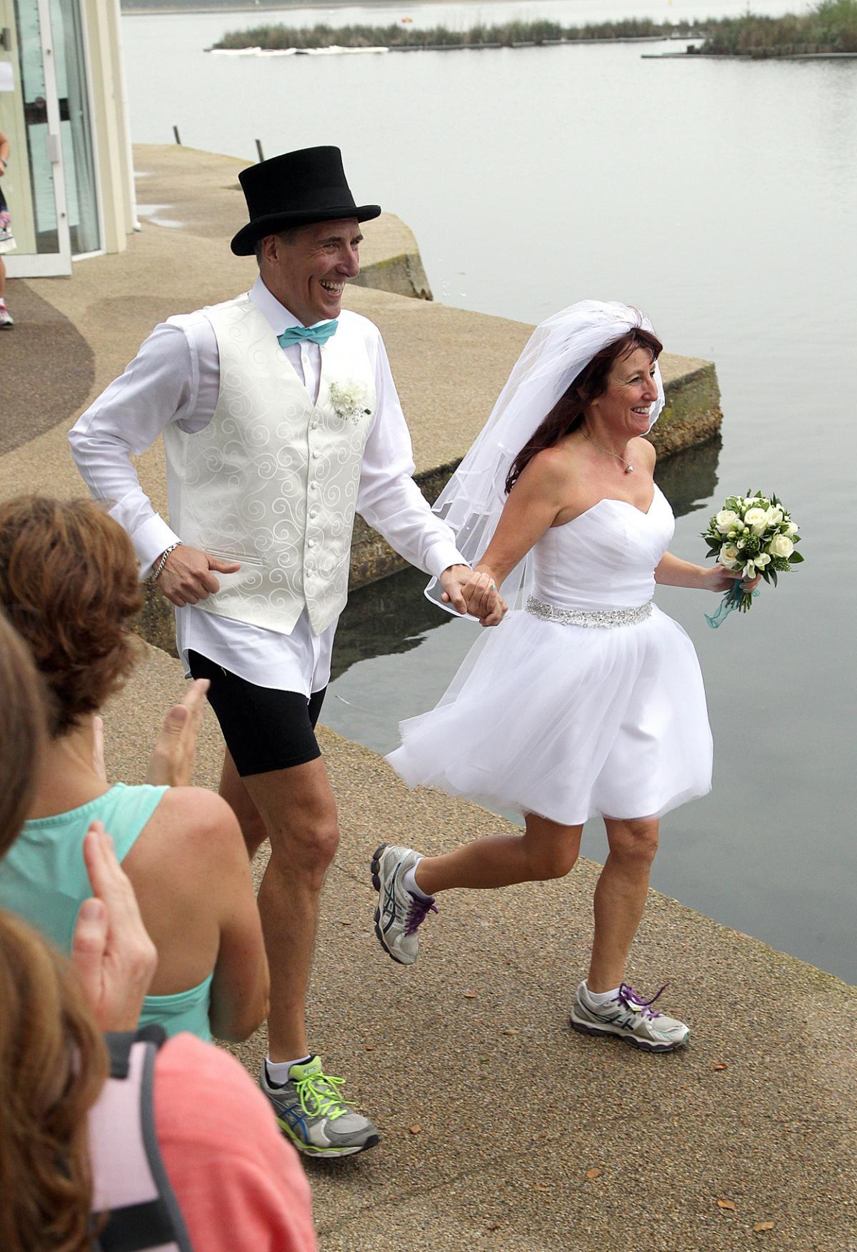 Keen runners Eve Carter and Graham Filmer tie the knot during the Poole parkrun. Photos by Sally Adams. 