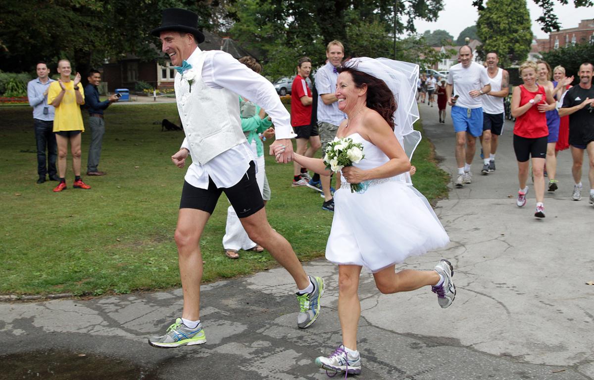 Keen runners Eve Carter and Graham Filmer tie the knot during the Poole parkrun. Photos by Sally Adams. 