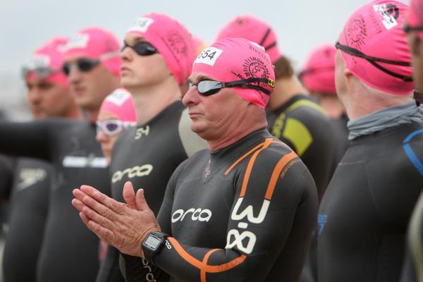 Swimmers taking part in the Poole Open Water swim  off  Sandbanks beach.