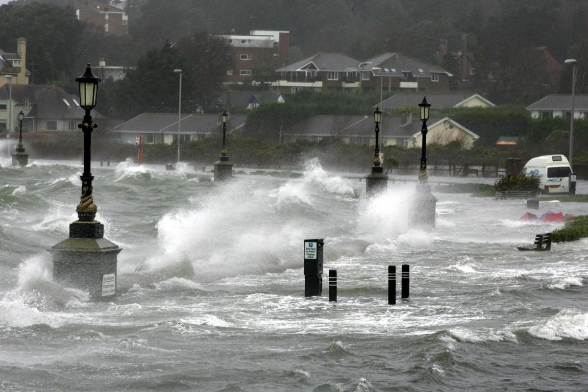 Sandbanks Road in Poole is flooded after the sea wall is swallowed up by the incoming tide during high winds and rain in 2008