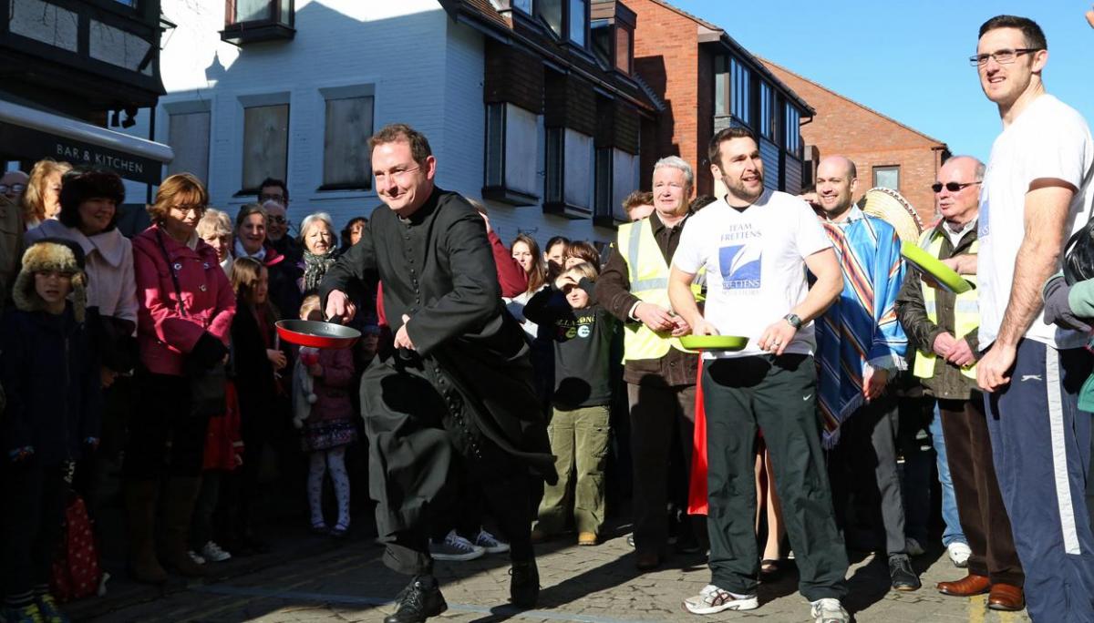 Pancake Day races take place in Christchurch on Shrove Tuesday. Pictures by Sally Adams.