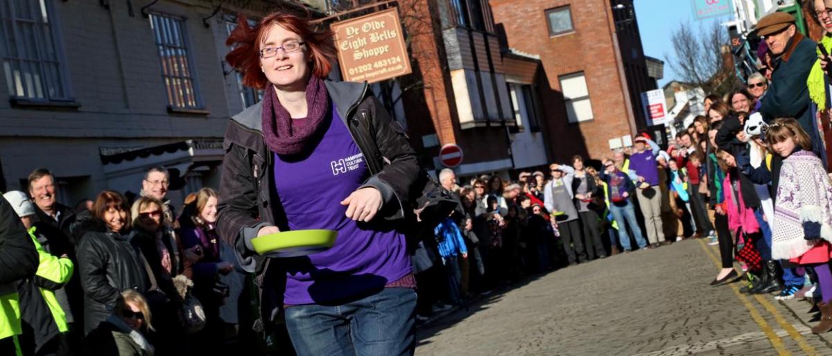 Pancake Day races take place in Christchurch on Shrove Tuesday. Pictures by Sally Adams.