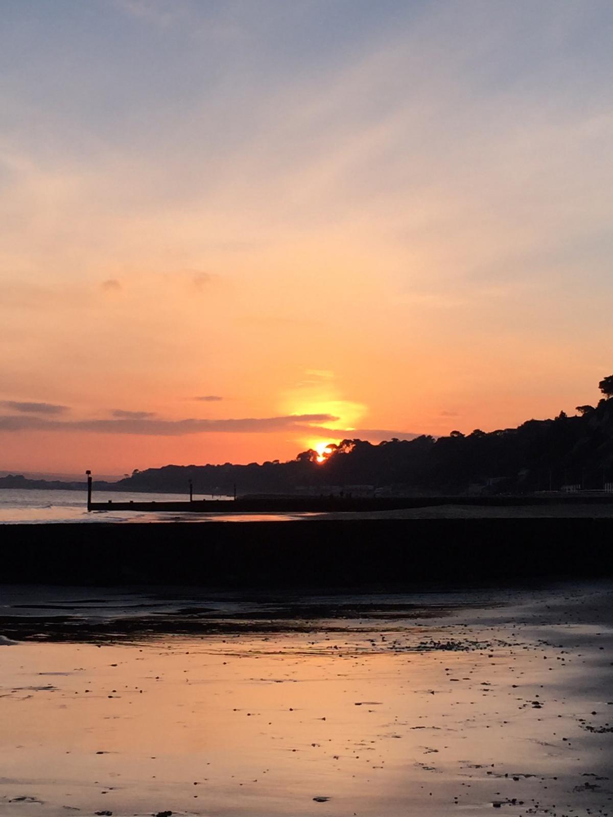 Sunset over Alumchine Beach taken by Susanne Otto.